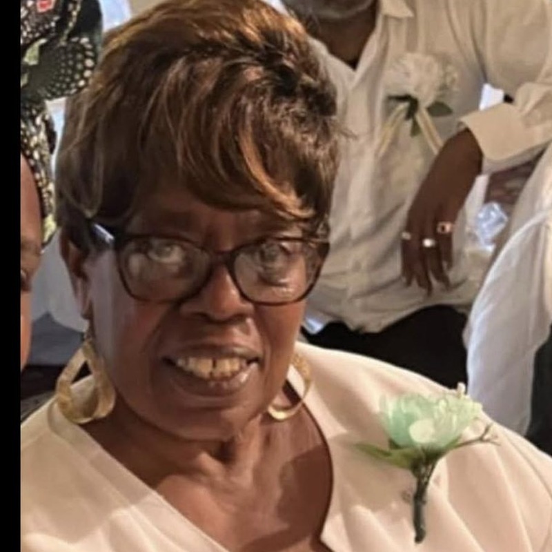 Doris “Jean” Hackney holding the Grands As Parents “Help A Child Keep A Smile” award