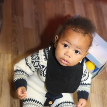 A baby at a Grands As Parents family gathering