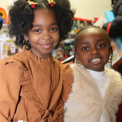 Children supported by Grands As Parents at a community gathering
